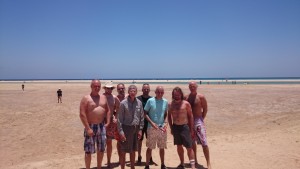 The 2015 trip members with the partially filled lagoon in the background.